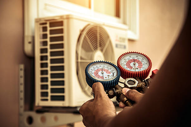 Professional Air Conditioning Service technician working in Brooke, VA